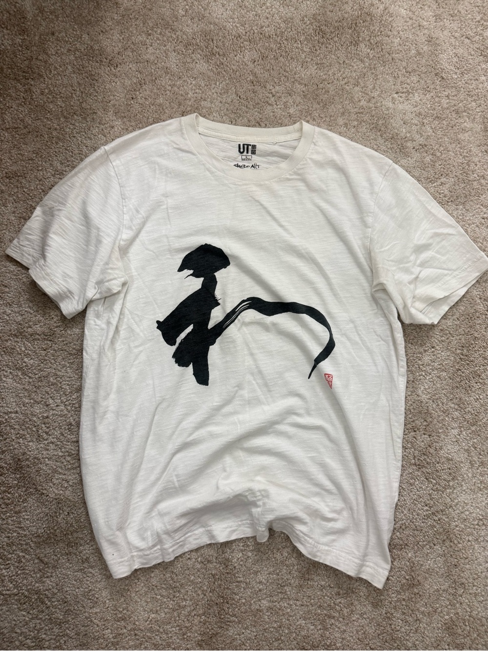 Uniqlo White Short Sleeve Tee with Black Brushstroke Graphic